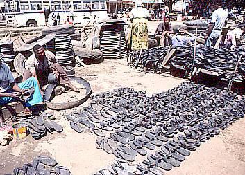 Making_sandals_from_old_tires_Niger.jpg