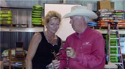 Terry Estes of Professional Choice demonstrating the features of a Bob Avila bit for one of the attendees.