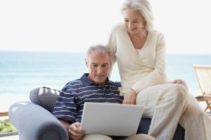 Man and woman using a laptop