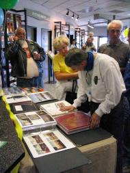 Customers look into the past 28 years of Champion Motorsports with photos throughout the years!