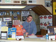 John at the counter ready to help!