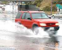 In a sudden downpour, driving fast or driving on worn tires can cause your tires to hydroplane— this means that your tires 'surf' along on a film of water just like a water skier.