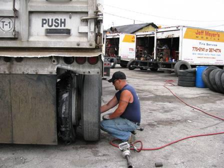 Dave changing a tractor trailer tire Dave changing a tractor trailer tire