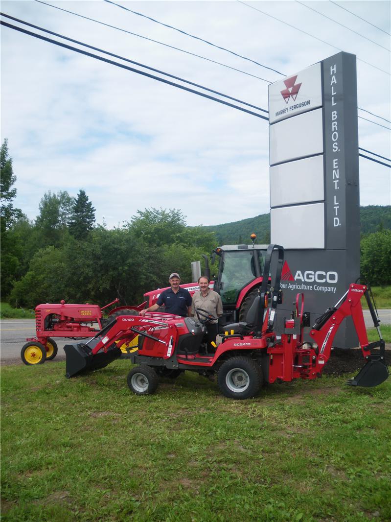 New MF Agco Sign with Owners 010.jpg