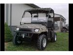2008 Polaris Ranger 700 XP Camo, options include 14" tire and wheel package, 4000lb winch, half windshield and soft top. Owner Shannon Hobbs
