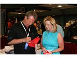 Mark Moseley signs an autograph for Lori Patton