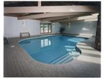 Indoor pool with brick deck