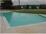 Pool, neg edge wall to lawn