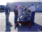 Dale explaining important facts about the snowmobile.
