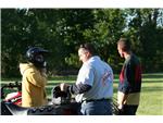 Going through pre-riding checklist.