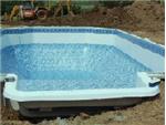 An 18'6" X 36'6" Grecian shape pool with 4' X 8' center steps.