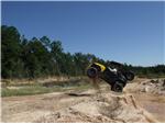 Robby jumping his RZR