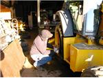 David Repairing A Backhoe Tire