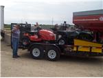 Gary Peterson Picking Up His New Toys