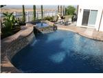 Flagstone spa cascade with sheer descent water features.