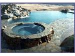 Rock spa with vanishing edge