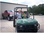 The Herrons and their new Bushhog!